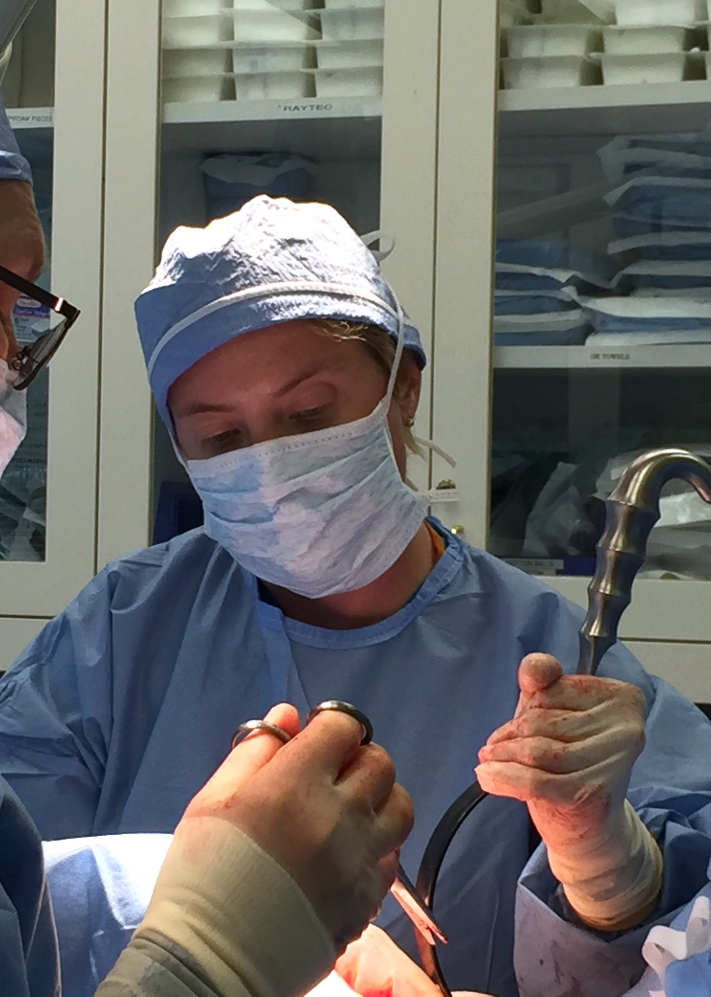 Monica Berlin assisting in surgery
